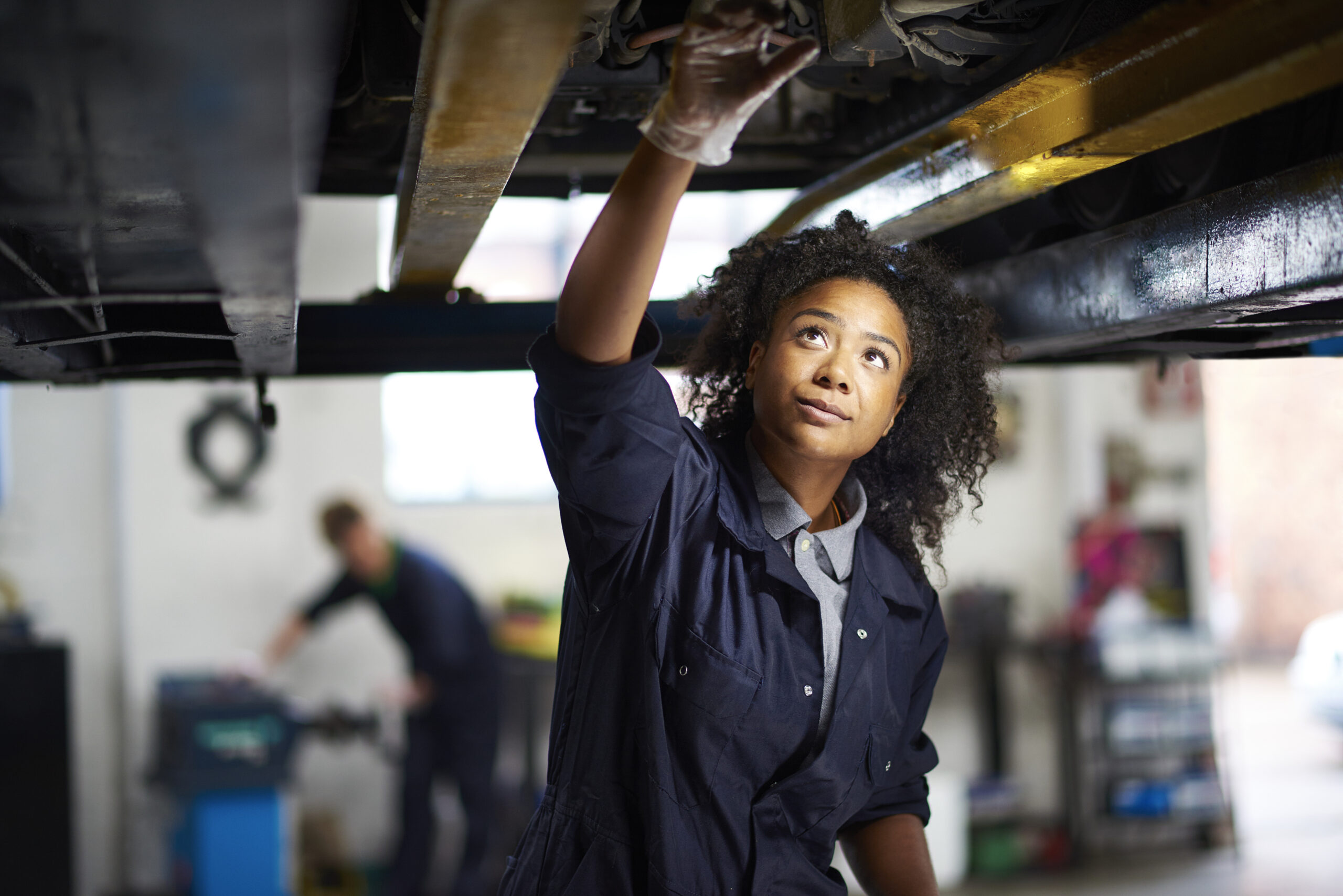 proud female garage mechanic 