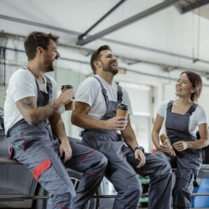 Workers taking a break from work and talking